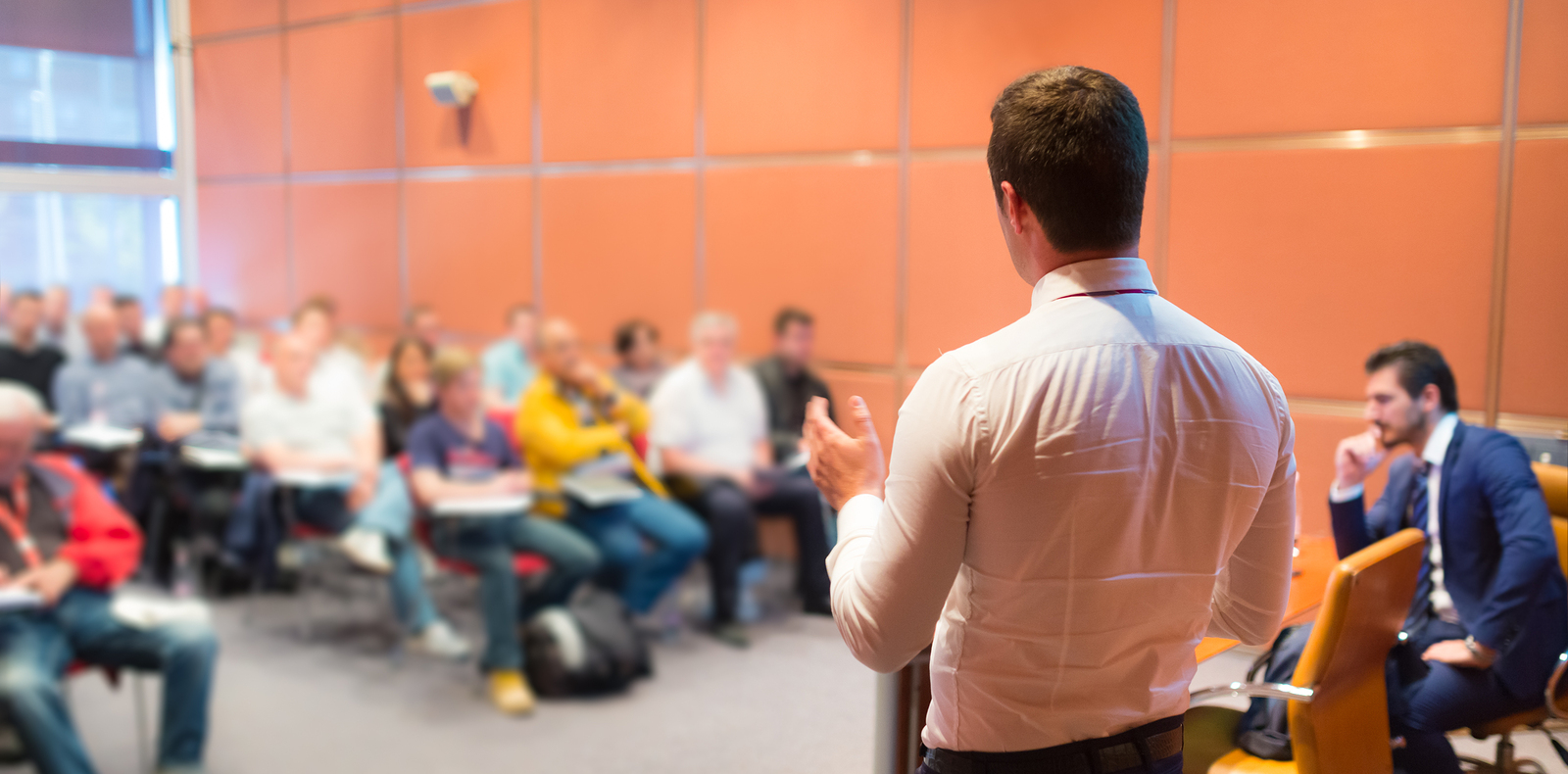 person talking at conference