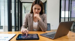 Business leader analyzing employee skills gap data and workforce development metrics